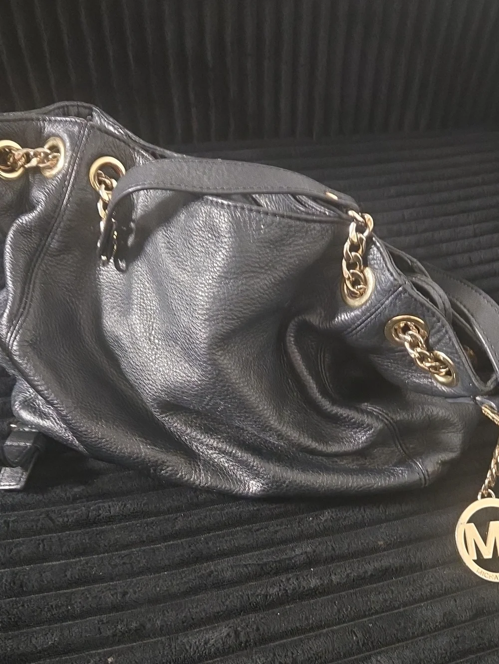 Black Leather Shoulder Bag with Gold Chain Accents